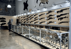 70 Inch Silver Extra Vision Display Cases in a Gun Store