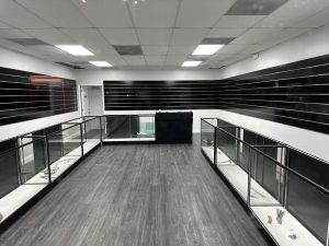 Black 48 Inch Extra Vision Display Cases in a Retail Store